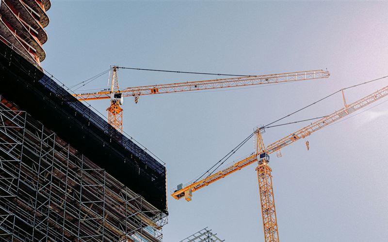 Tower cranes over a building under construction